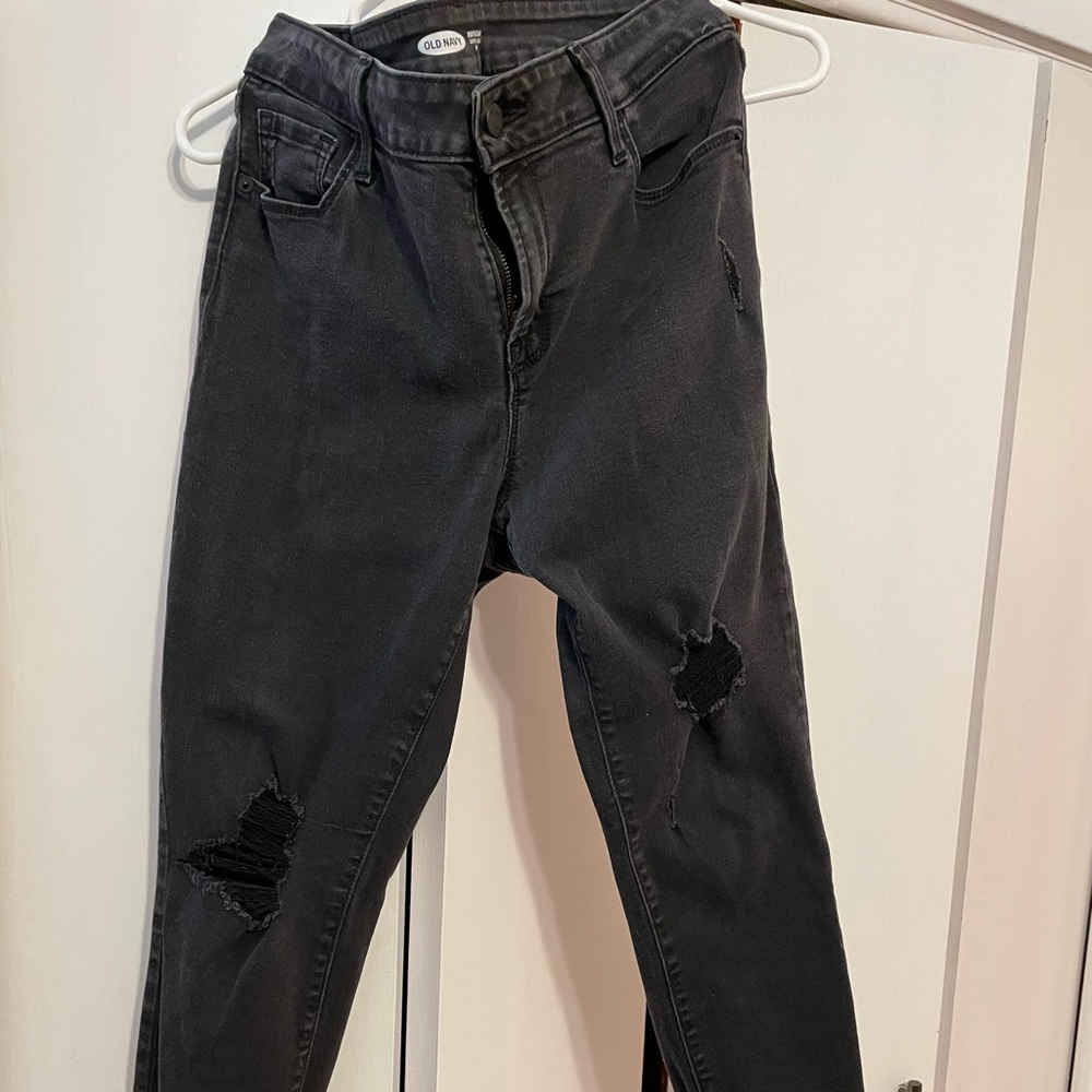Faded black distressed jeans